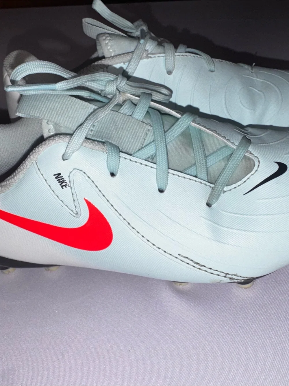 Nike Kids Light mint/White Soccer cleats with Black Swoosh